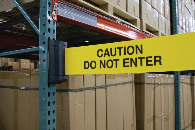 Caution - Do Not Enter Sign - Wall Mount Barrier In a Warehouse
