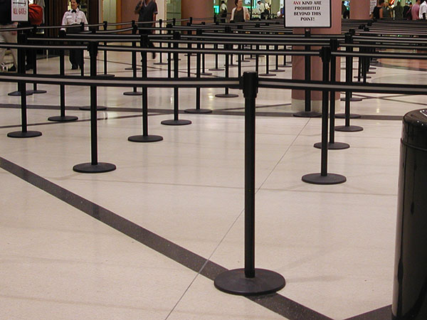 Queue Management System Made Up Of Belt Barriers And Signage At Convention